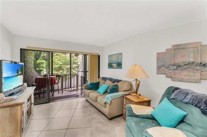 Great end unit with views of the pool and bay.  Tile floor - Beach Home for sale in Marco Island, Florida on Beachhouse.com