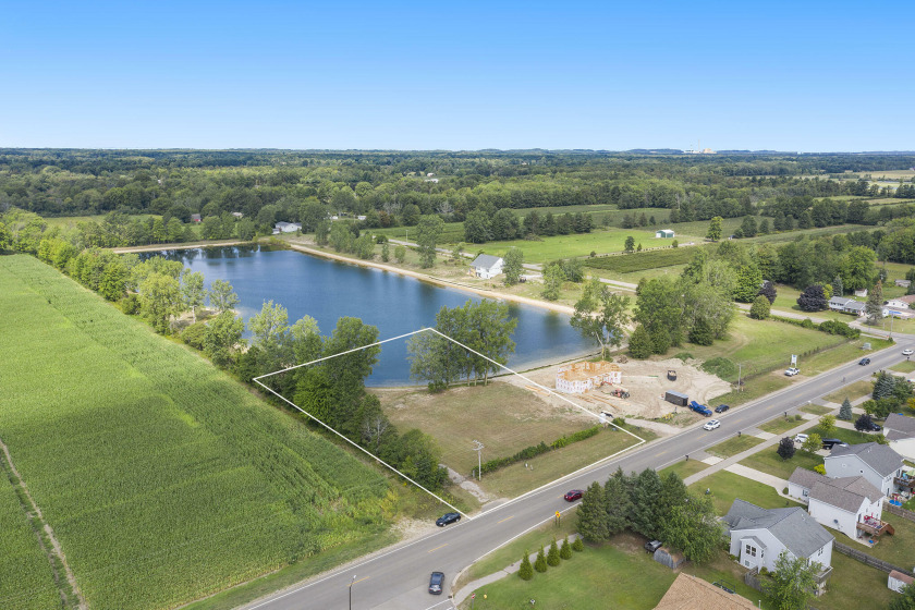 Buildable lot with excellent views of Topper Lake and private - Beach Lot for sale in Holland, Michigan on Beachhouse.com