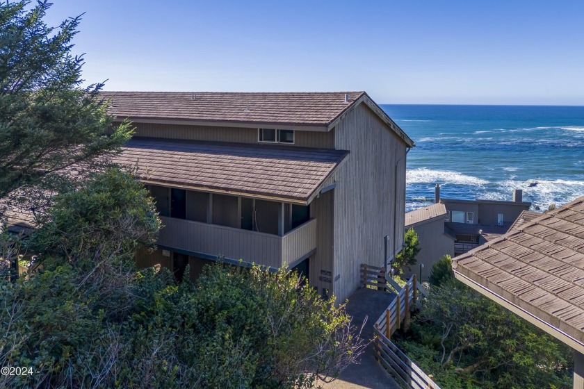 Time to enjoy the spectacular coastal sunsets with beautiful - Beach Condo for sale in Otter Rock, Oregon on Beachhouse.com