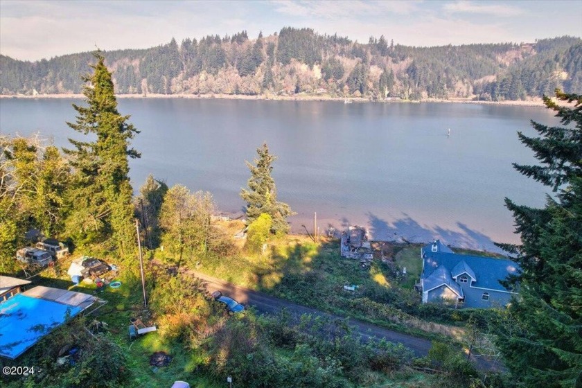 Discover tranquility on this stunning .69-acre hidden gem on - Beach Lot for sale in Toledo, Oregon on Beachhouse.com