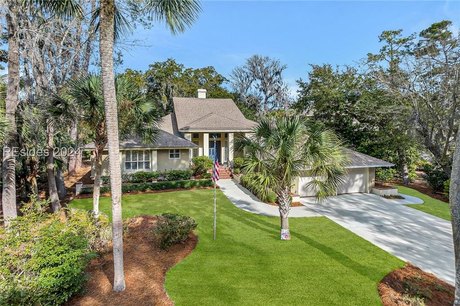 This exquisite 4-bedroom residence, nestled on a remarkable lot - Beach Home for sale in Hilton Head Island, South Carolina on Beachhouse.com