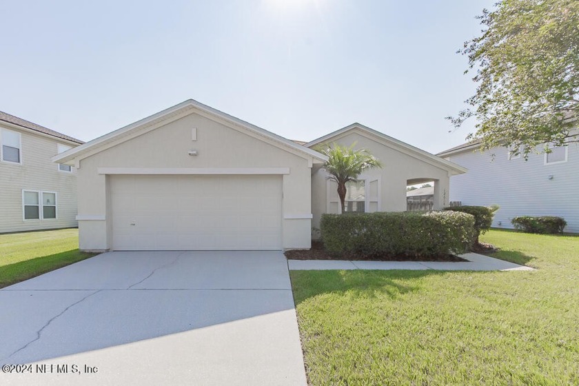 Discover suburban bliss in this charming three-bedroom - Beach Home for sale in Jacksonville, Florida on Beachhouse.com