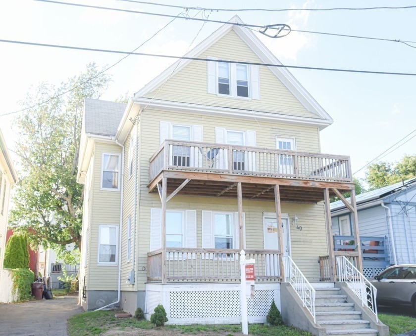 Lovely Two Family Home in Prime Location. Move-in ready and a - Beach Home for sale in Revere, Massachusetts on Beachhouse.com