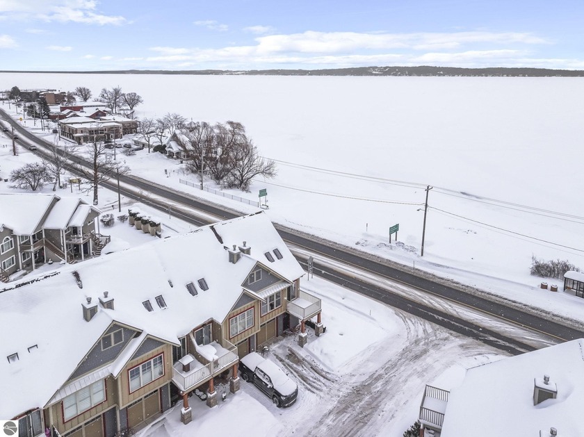 Now Available this 3-bedroom, 3-bath end-unit condo in Edgewater - Beach Condo for sale in Traverse City, Michigan on Beachhouse.com