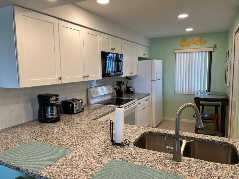 Remodeled! Granite! Sandcastles 2 BR Direct Space Coast - Beach Vacation Rentals in Cocoa Beach, Florida on Beachhouse.com