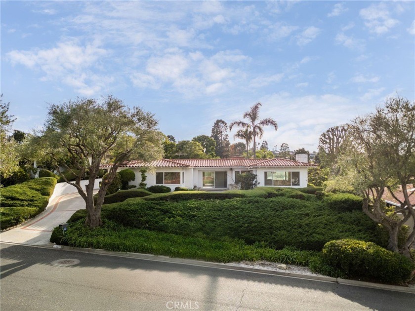 This family home offers a rare sense of privacy while being - Beach Home for sale in Palos Verdes Estates, California on Beachhouse.com