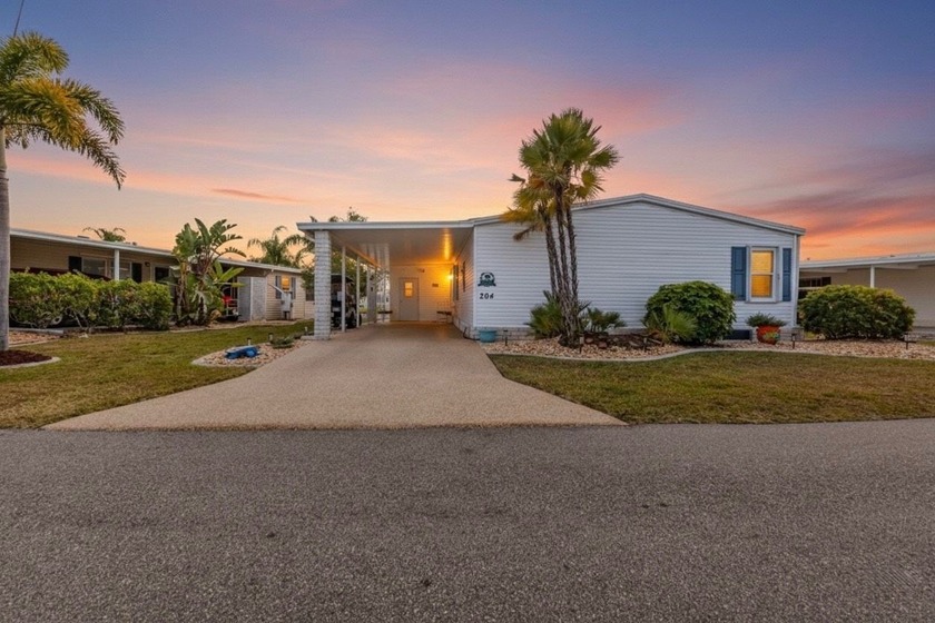 Enjoy secure, low-maintenance Florida living with lake views - Beach Home for sale in Punta Gorda, Florida on Beachhouse.com