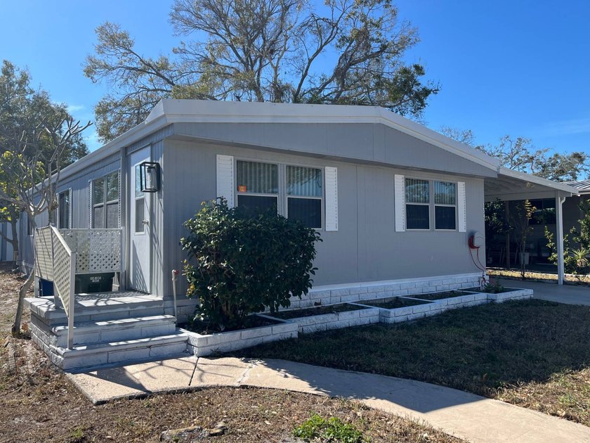 2 Bed/2 Bath cutie set back from the road has been largely - Beach Home for sale in Clearwater, Florida on Beachhouse.com