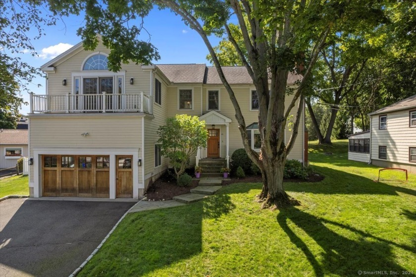 This exquisite 5-bedroom, 3-bath home set in a cul-de-sac within - Beach Home for sale in Fairfield, Connecticut on Beachhouse.com