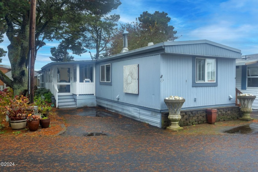 Enjoy coastal living in this well maintained home nestled along - Beach Home for sale in Waldport, Oregon on Beachhouse.com