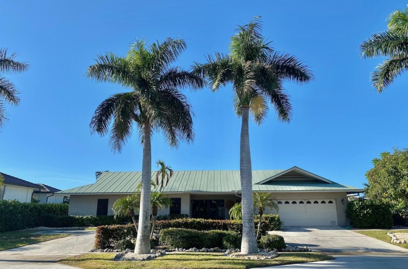 Discover the charm of this comfortable 4-bedroom, 3-bath home - Beach Home for sale in Marco Island, Florida on Beachhouse.com