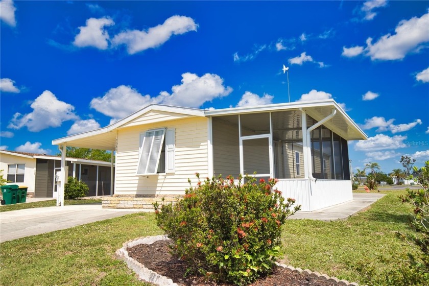 This FURNISHED, TURN KEY, GULF ACCESS home in the active Village - Beach Home for sale in Port Charlotte, Florida on Beachhouse.com