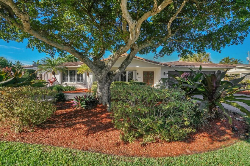 Welcome to this charming 4-bedroom, 3-bath home in the heart of - Beach Home for sale in Lighthouse Point, Florida on Beachhouse.com