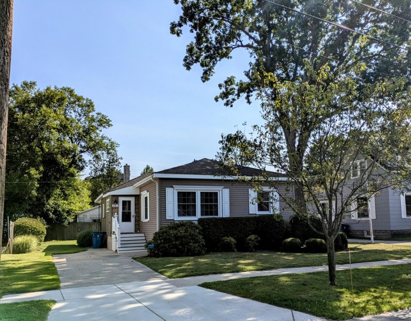 This home is a must-see! It features an open floor plan, bamboo - Beach Home for sale in Manistee, Michigan on Beachhouse.com