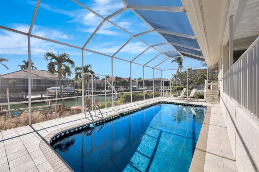 This beautifully maintained waterfront home with a sunny - Beach Home for sale in Marco Island, Florida on Beachhouse.com