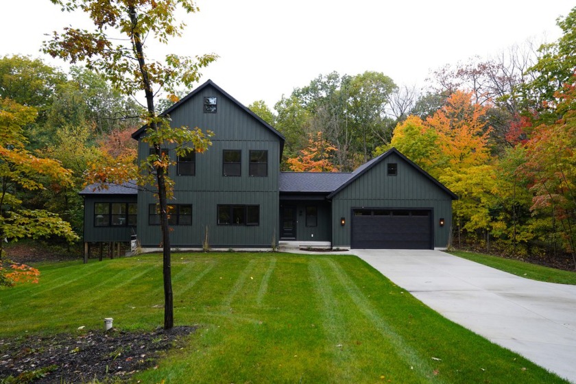 This nearly-new custom built & professionally designed home - Beach Home for sale in West Olive, Michigan on Beachhouse.com