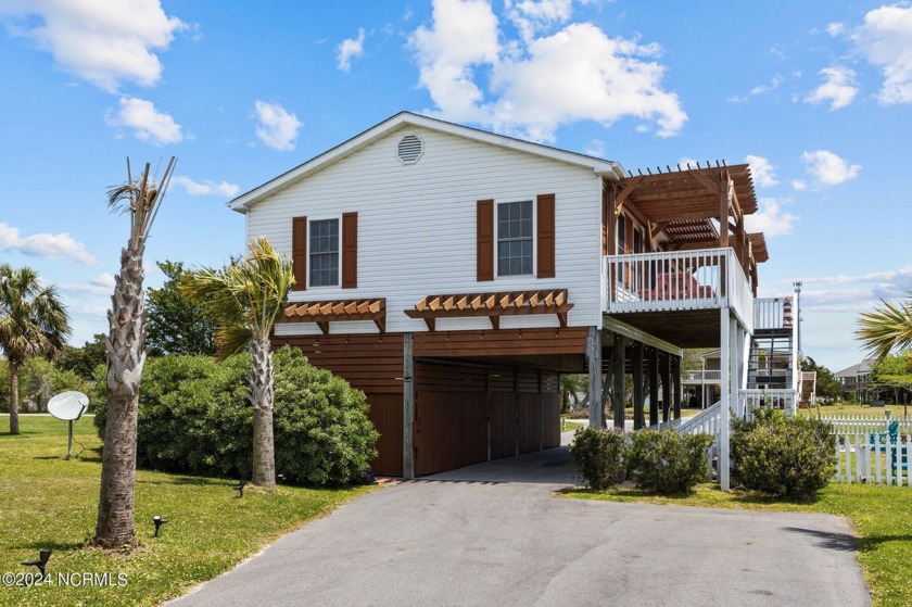 This property isn't just a home, it's a lifestyle. Nestled among - Beach Home for sale in Cedar Point, North Carolina on Beachhouse.com