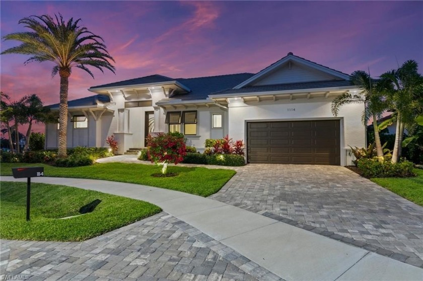 Welcome to this exceptional single-story waterfront residence - Beach Home for sale in Marco Island, Florida on Beachhouse.com