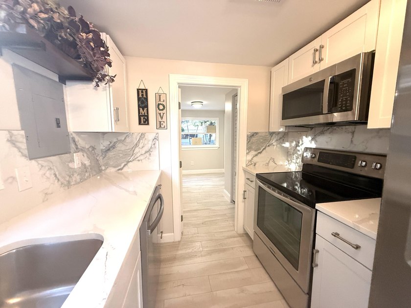 why rent ???? priced right !!! TOTALLY RENOVATED WITH NEW ROOF - Beach Home for sale in Lantana, Florida on Beachhouse.com