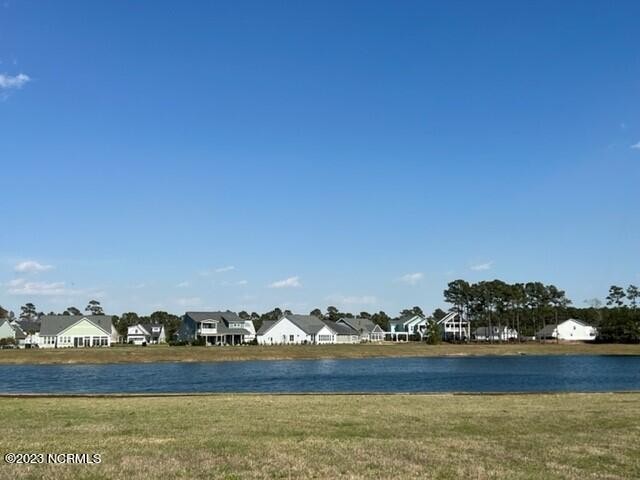 Build your coastal cottage dream house on this unique lakefront - Beach Lot for sale in Holly Ridge, North Carolina on Beachhouse.com
