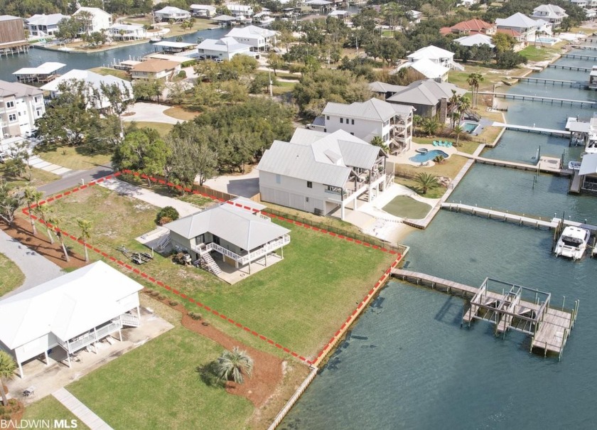 28304 Burkhart Drive, an exquisite waterfront property nestled - Beach Home for sale in Orange Beach, Alabama on Beachhouse.com