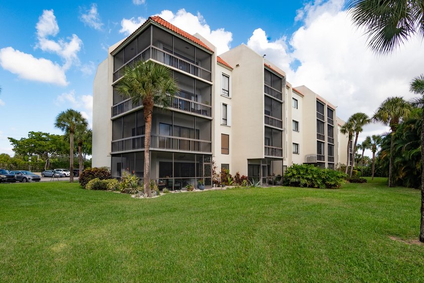 Enjoy the beautiful views of the palm trees in this cozy 2 - Beach Condo for sale in West Palm Beach, Florida on Beachhouse.com