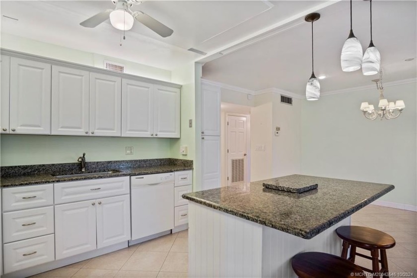 Dine Alfresco on your private, extra large, patio. This first - Beach Condo for sale in Stuart, Florida on Beachhouse.com