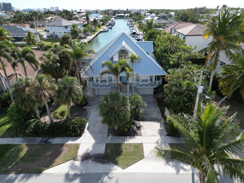 Discover this beautifully maintained Olde Florida-style - Beach Home for sale in Marco Island, Florida on Beachhouse.com