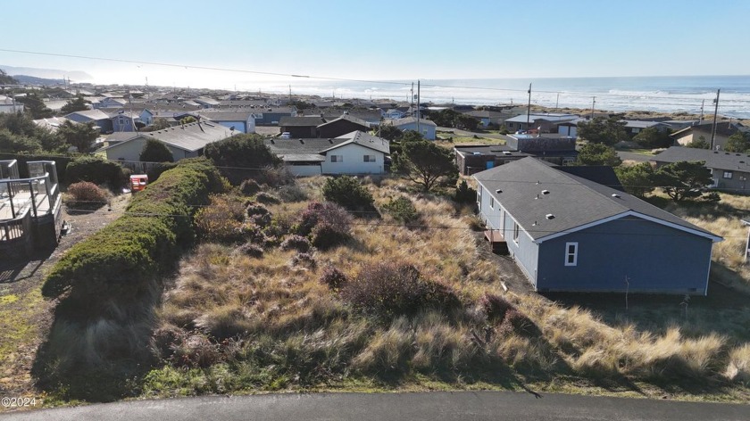 Build your ideal coastal retreat on this flat lot spanning .18 - Beach Lot for sale in Waldport, Oregon on Beachhouse.com