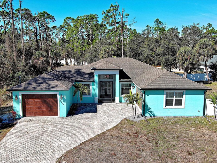 Welcome to this 2018 custom-built home located in the - Beach Home for sale in North Port, Florida on Beachhouse.com