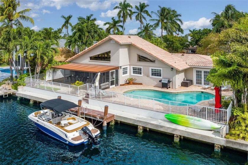 Welcome home to this spectacular waterfront home featuring 3 - Beach Home for sale in Pompano Beach, Florida on Beachhouse.com