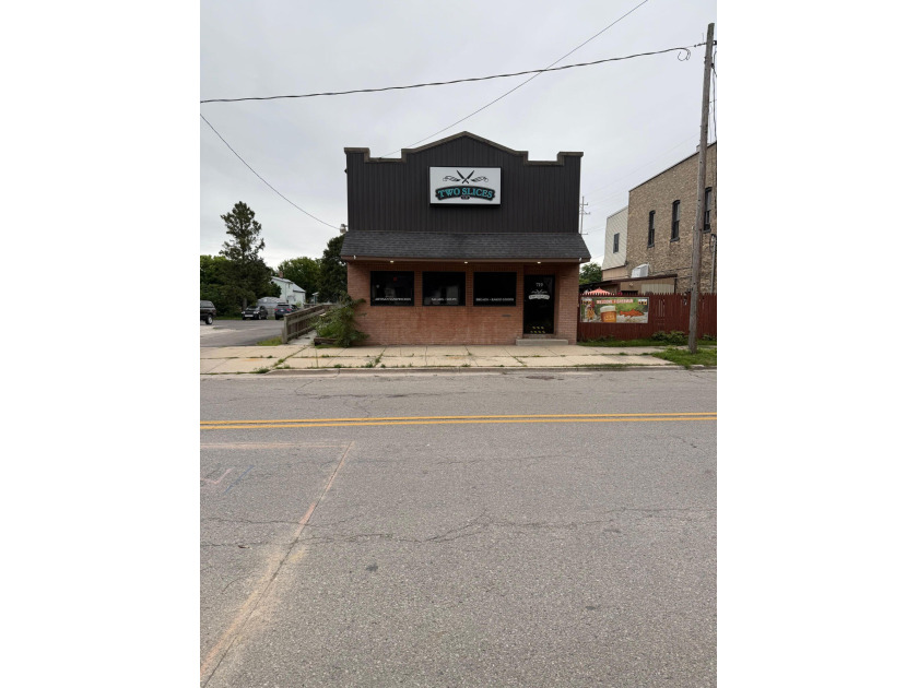 This is a great opportunity to own a fully equipped 2,191 sq. ft - Beach Commercial for sale in Manistee, Michigan on Beachhouse.com