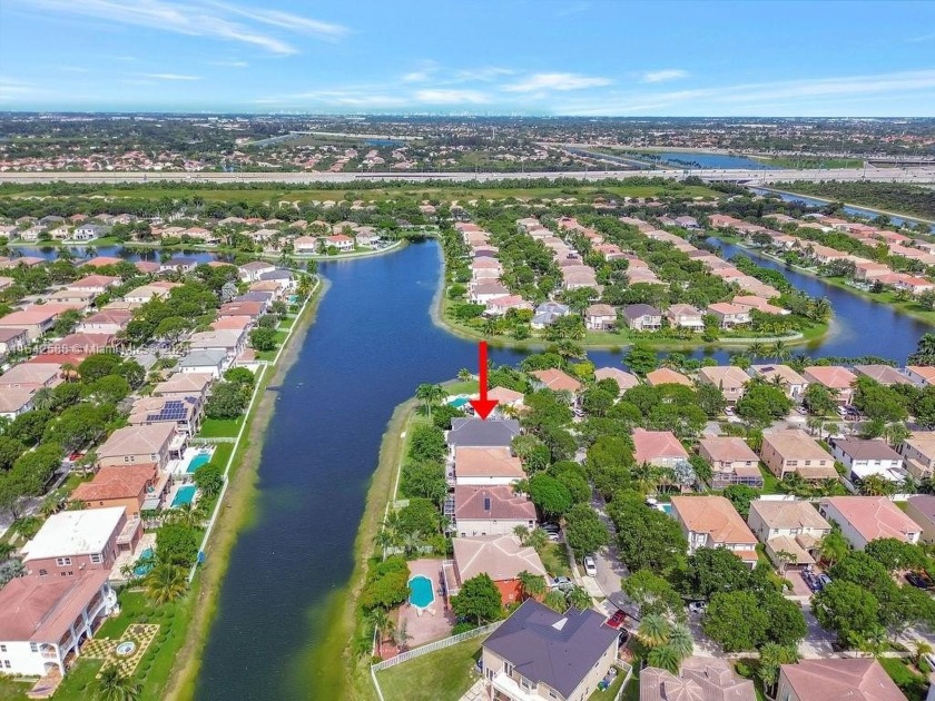 Welcome to this stunning two-story lakefront home in Riviera - Beach Home for sale in Miramar, Florida on Beachhouse.com