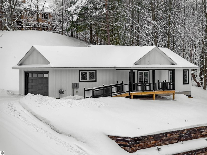 Positioned at the base of iconic Sugarloaf Mountain and - Beach Home for sale in Cedar, Michigan on Beachhouse.com