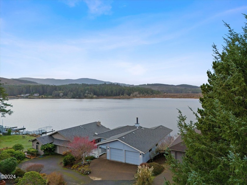 Lake Front Indian Shores home with a private dock, 4 bedrooms - Beach Home for sale in Lincoln City, Oregon on Beachhouse.com