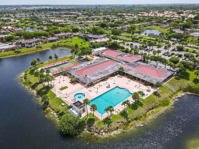 Why do the stairs, especially in this charming 55+ lake - Beach Condo for sale in West Palm Beach, Florida on Beachhouse.com