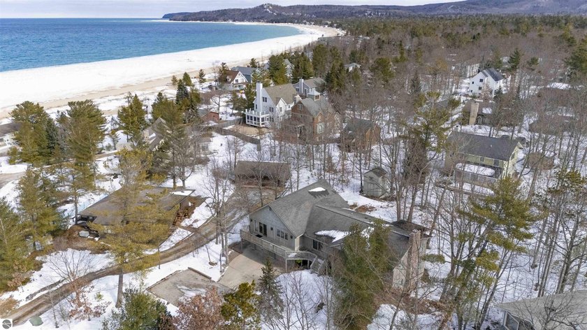 THE BEST OF BOTH WORLDS! A rare offering of a spacious four - Beach Home for sale in Glen Arbor, Michigan on Beachhouse.com