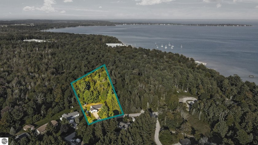 Nestled on nearly two acres of peaceful woods in one of Leelanau - Beach Home for sale in Northport, Michigan on Beachhouse.com