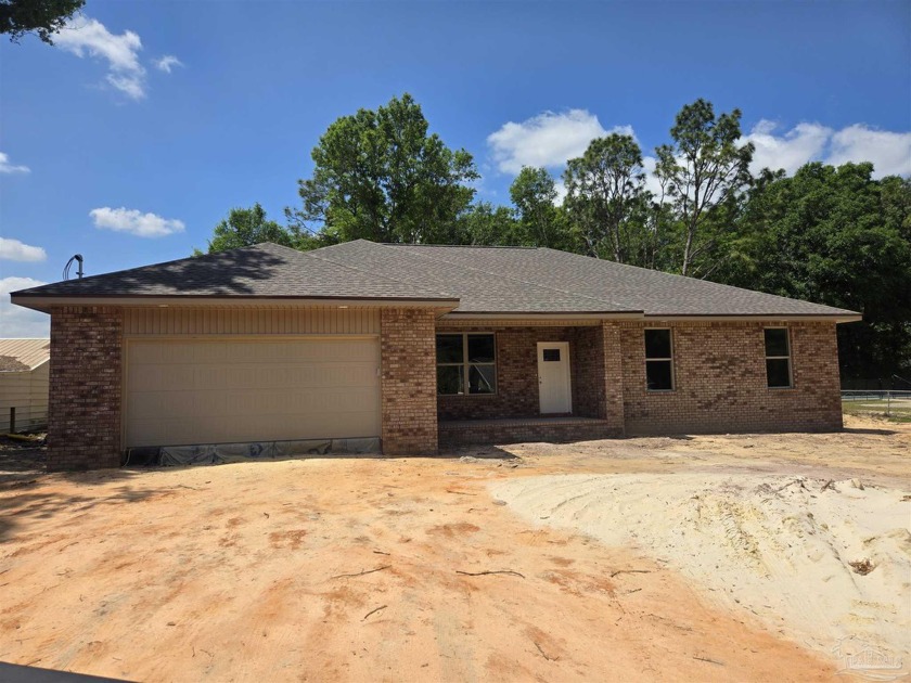 Welcome to this brand new, 4 bed 2 bath home with no HOA dues!!! - Beach Home for sale in Milton, Florida on Beachhouse.com