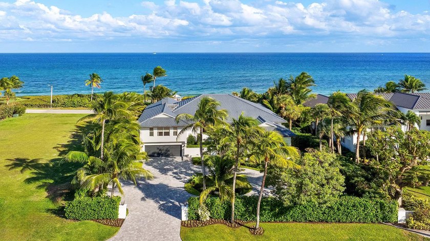This meticulously renovated coastal property sits on a rare - Beach Home for sale in Ocean Ridge, Florida on Beachhouse.com