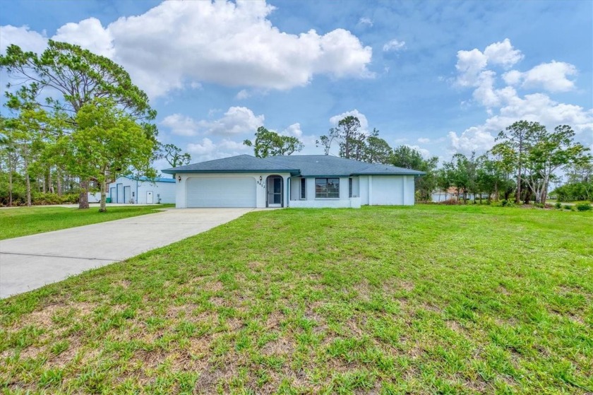 3 LOTS! Spacious 3 Bedroom Pool Home with Detached 3-Car - Beach Home for sale in Port Charlotte, Florida on Beachhouse.com