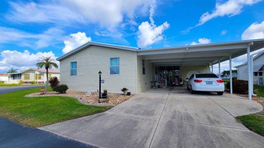 Welcome to this stunning 2-bedroom, 2-bathroom + DEN home - Beach Home for sale in Punta Gorda, Florida on Beachhouse.com