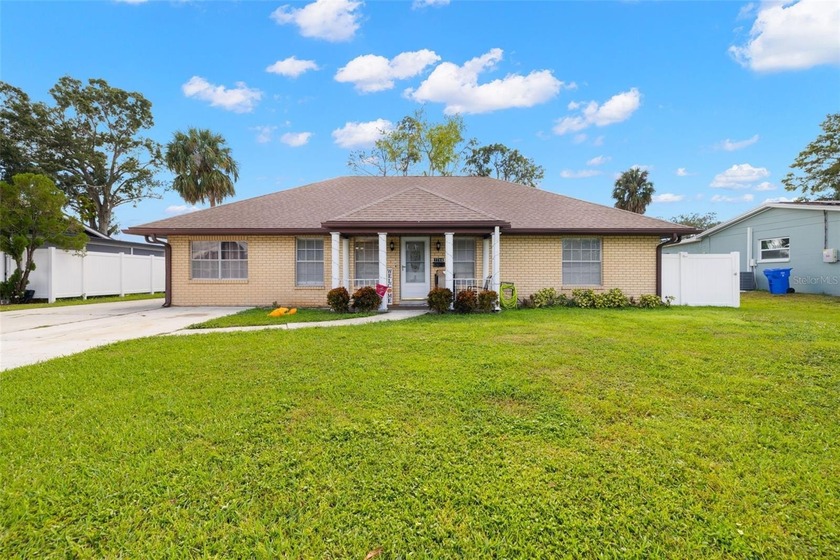 Welcome to this charming 4-bedroom, 2-bathroom home perfectly - Beach Home for sale in Tampa, Florida on Beachhouse.com