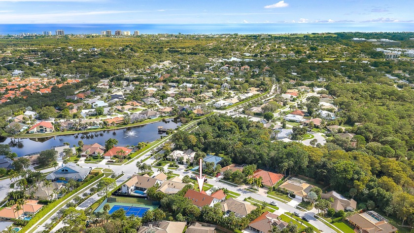 Welcome to this exceptional residence in the gated community of - Beach Home for sale in Palm Beach Gardens, Florida on Beachhouse.com