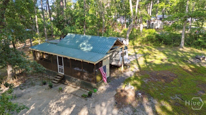 Discover this charming .58-acre property offering versatile - Beach Lot for sale in Midway, Georgia on Beachhouse.com
