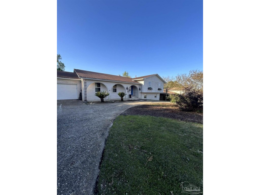 This home is no cookie-cutter home!!  It is located in Scenic - Beach Home for sale in Pensacola, Florida on Beachhouse.com