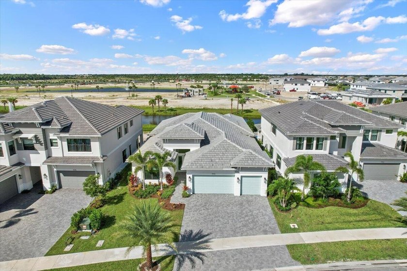 Luxury in Apex at Avenir. 4 Bedroom 4.5 bath lakefront home with - Beach Home for sale in Palm Beach Gardens, Florida on Beachhouse.com