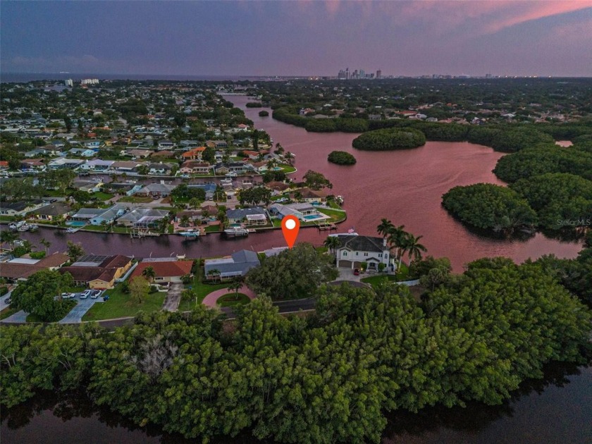 Nestled in the highly coveted enclave of Ponderosa Shores in - Beach Home for sale in St. Petersburg, Florida on Beachhouse.com