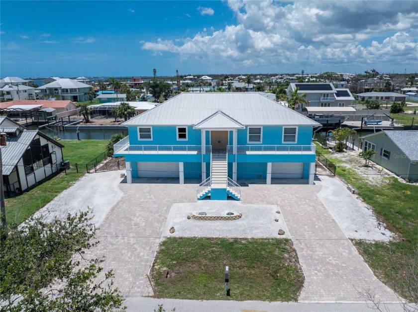 This WATERFRONT - NO BRIDGES TO BAY - HOME IS BUILT LIKE A - Beach Home for sale in Englewood, Florida on Beachhouse.com