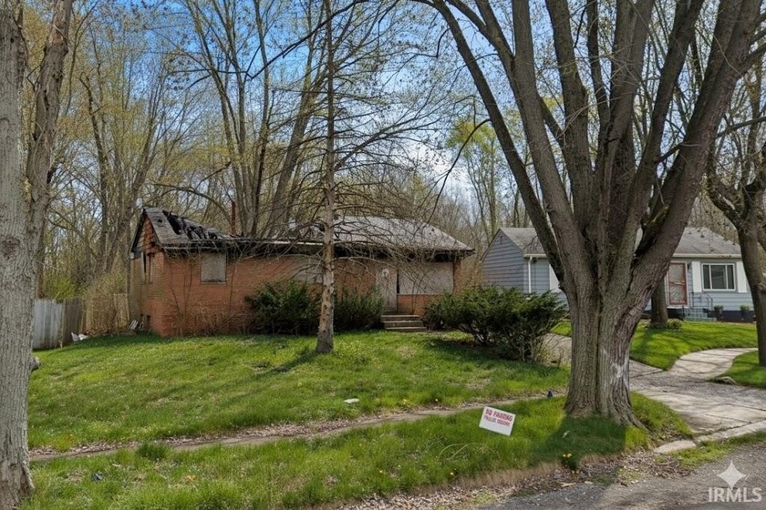 This 2-bed, 1-bath ranch offers about 950 sq ft of living space - Beach Home for sale in Gary, Indiana on Beachhouse.com